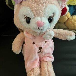 Adorable Plush Toy with Pink Outfit